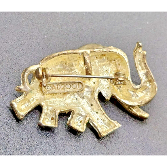 Vintage Rhinestone Elephant Brooch AD 2001 Red Eye Gold Tone Trunk Up Tusk Pin - Picture 8 of 11